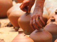 Drying pots and potters hand in Bhaktapur