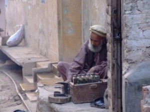 Man selling bottles in Peshawar