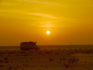 A lone truck at sunset from the train to Peshawar, Pakistan