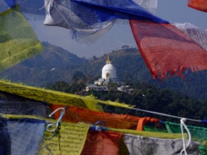 A view of the World Peace Stupa through prayer flags, Pokhra, Nepal (click to enlarge)