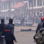 Police throwing bricks back Police throwing bricks back