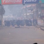 The riot police charge forward in Kathmandu The riot police charge forward in Kathmandu