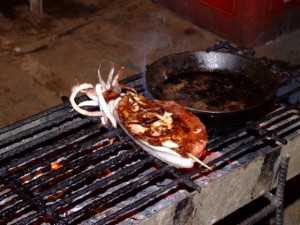 Squid from the Philippines roasting on a Barbecue Squid from the Philippines roasting on a Barbecue (click to enlarge)