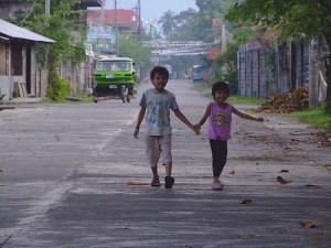 Children walking Hand in Hand, Brooke's Point, Palawan Children walking Hand in Hand, Brooke's Point, Palawan