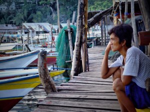 Filippina Lady thinking in Puerto Princessa, The Philippines (click to enlarge)