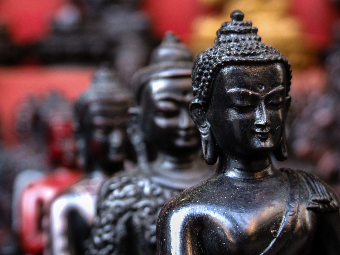 wooden Buddha statues in Nepal