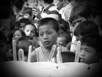 Filippino boy waiting for food aid in The Philippines