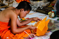 Monk sticks decorations on a paper lantern