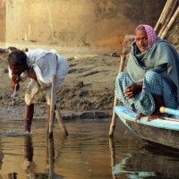 Men washing in the Ganges at Dawn