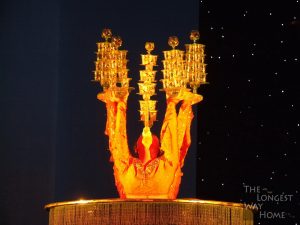 Chinese acrobat balancing glasses