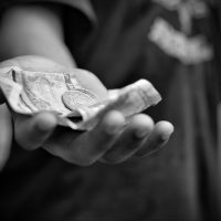 Child holding Money in Nepal_resize