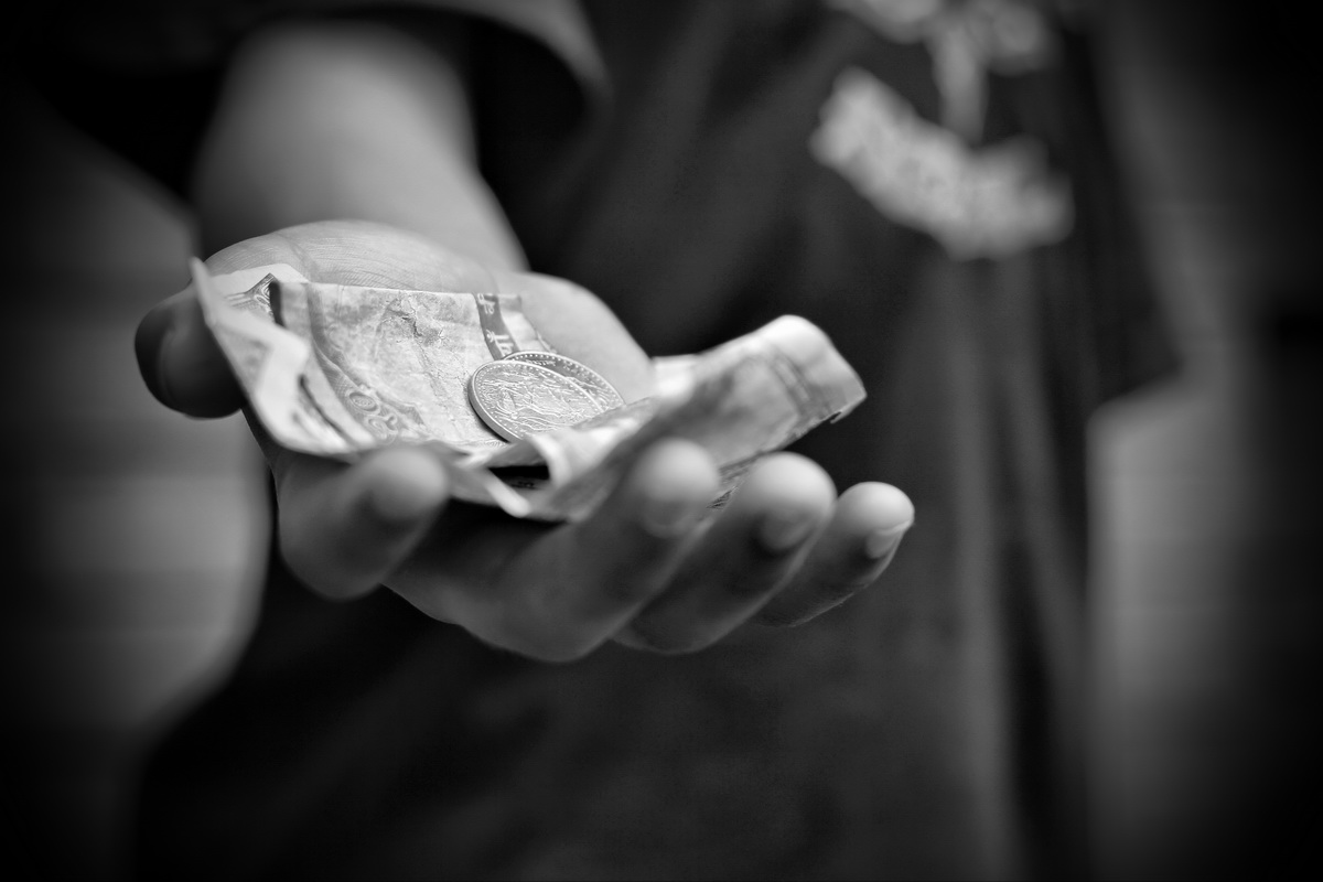 Child holding Money in Nepal_resize