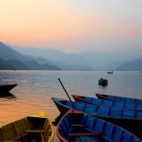 Boats by Phewa Lake in Pokhara , Nepal